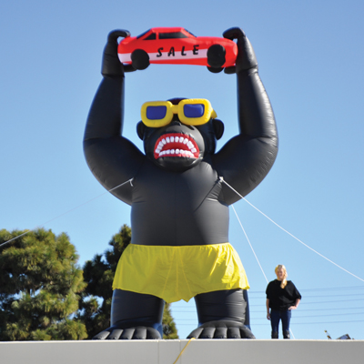 Giant Gorilla Inflatable Holding Car